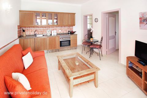 Living area with open kitchen and sofa – Chio, Tenerife