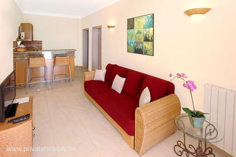 Living room with sofa and open kitchen – Chio, Tenerife