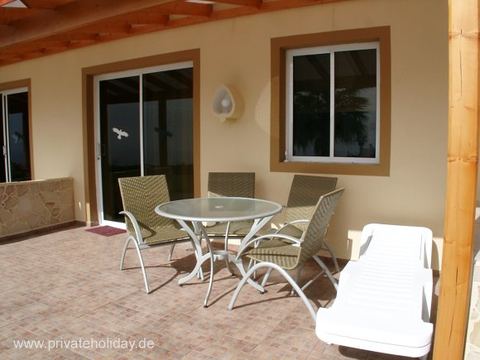 Terrace with glass table and sun lounger – Chio, Tenerife
