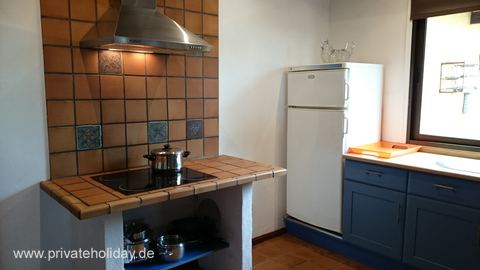 Kitchen with tiled stove and refrigerator – La Matanza, Tenerife