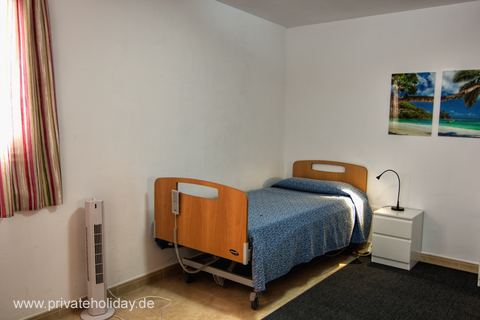 Single room with care bed and bedside table – Los Cristianos, Tenerife