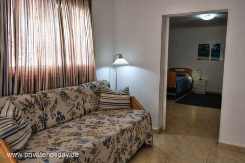 Living room with sofa bed and floor lamp – Los Cristianos, Tenerife