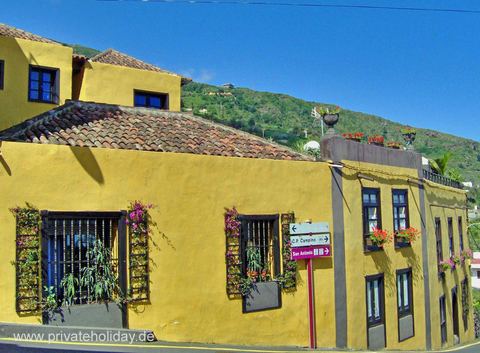 Yellow house facade with flower boxes – Icod de los Vinos, Tenerife
