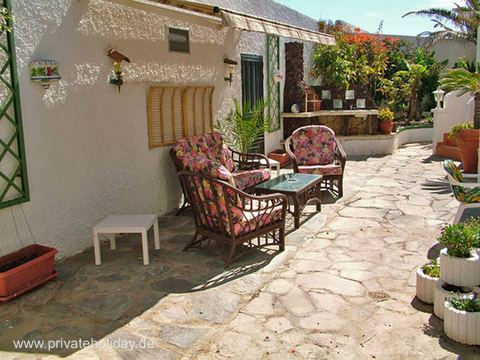 Paved terrace with wicker chairs and table – Poris de Abona, Tenerife