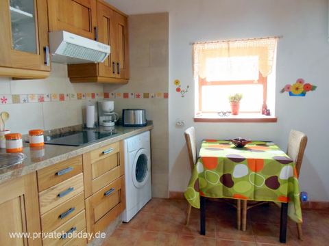Small kitchen with dining table by window – Igueste de San Andrés, Tenerife