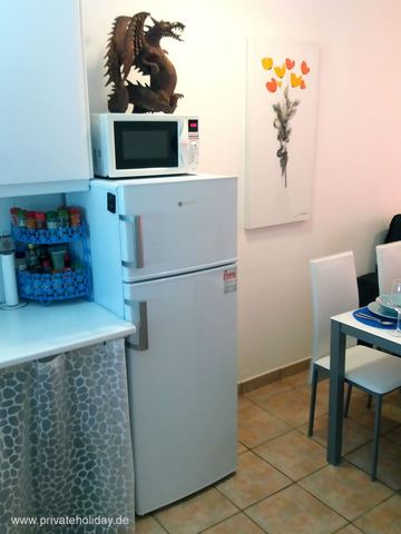Kitchen area with fridge and microwave – Costa Calma, Fuerteventura