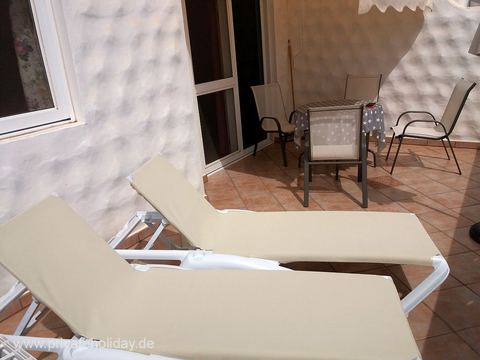 Terrace with two sun loungers and table – Costa Calma, Fuerteventura