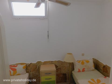 Bedroom with two single beds and window – Costa Calma, Fuerteventura