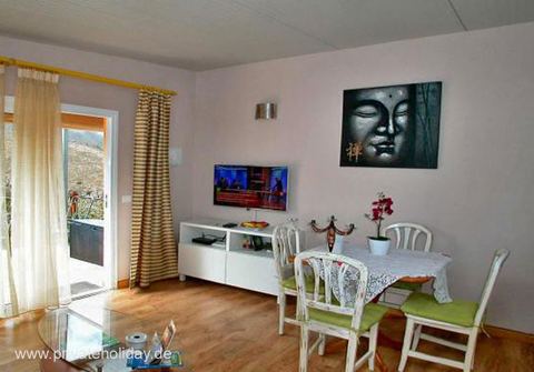Comedor con puerta a la terraza y mueble TV – Guía de Isora, Tenerife