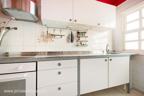 Kitchen with white cabinets and stainless steel sink – Chayofa, Tenerife