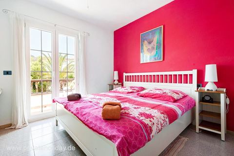 Bright bedroom with balcony door and double bed – Chayofa, Tenerife
