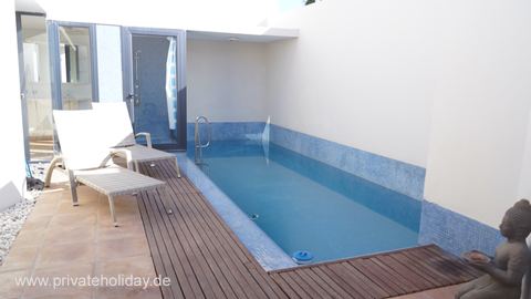 Narrow pool with wooden deck and lounger – Costa Calma, Fuerteventura
