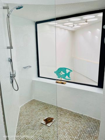 Shower with mosaic floor and glass wall – Costa Calma, Fuerteventura