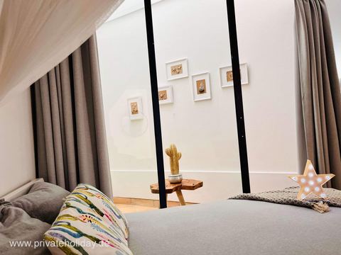 Bedroom with double bed and curtains – Costa Calma, Fuerteventura