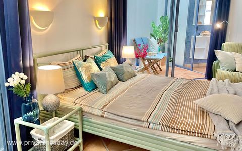 Dormitorio luminoso con cama doble y zona de estar – Costa Calma, Fuerteventura