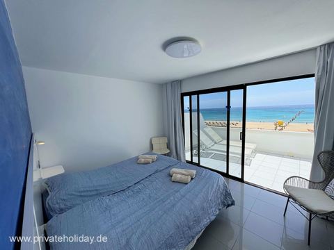 Schlafzimmer mit Terrassentür und Meerblick – Costa Calma, Fuerteventura