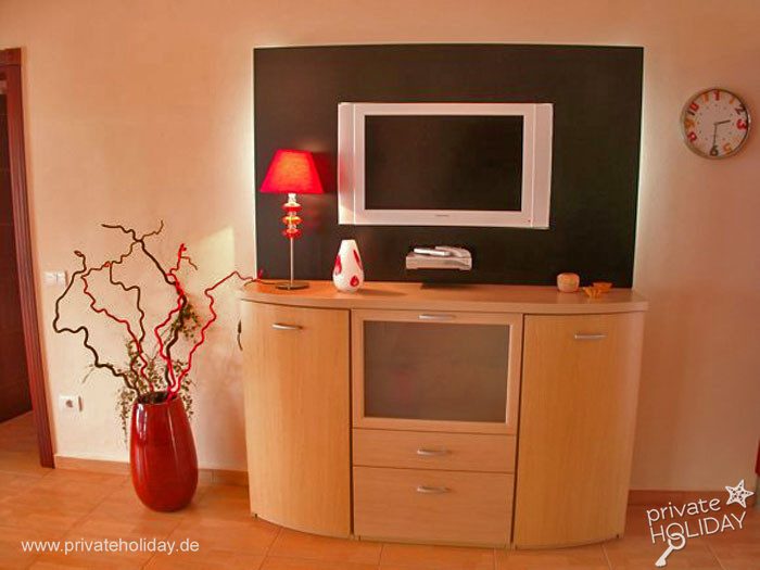 Living room with TV and wooden sideboard – Guía de Isora, Tenerife