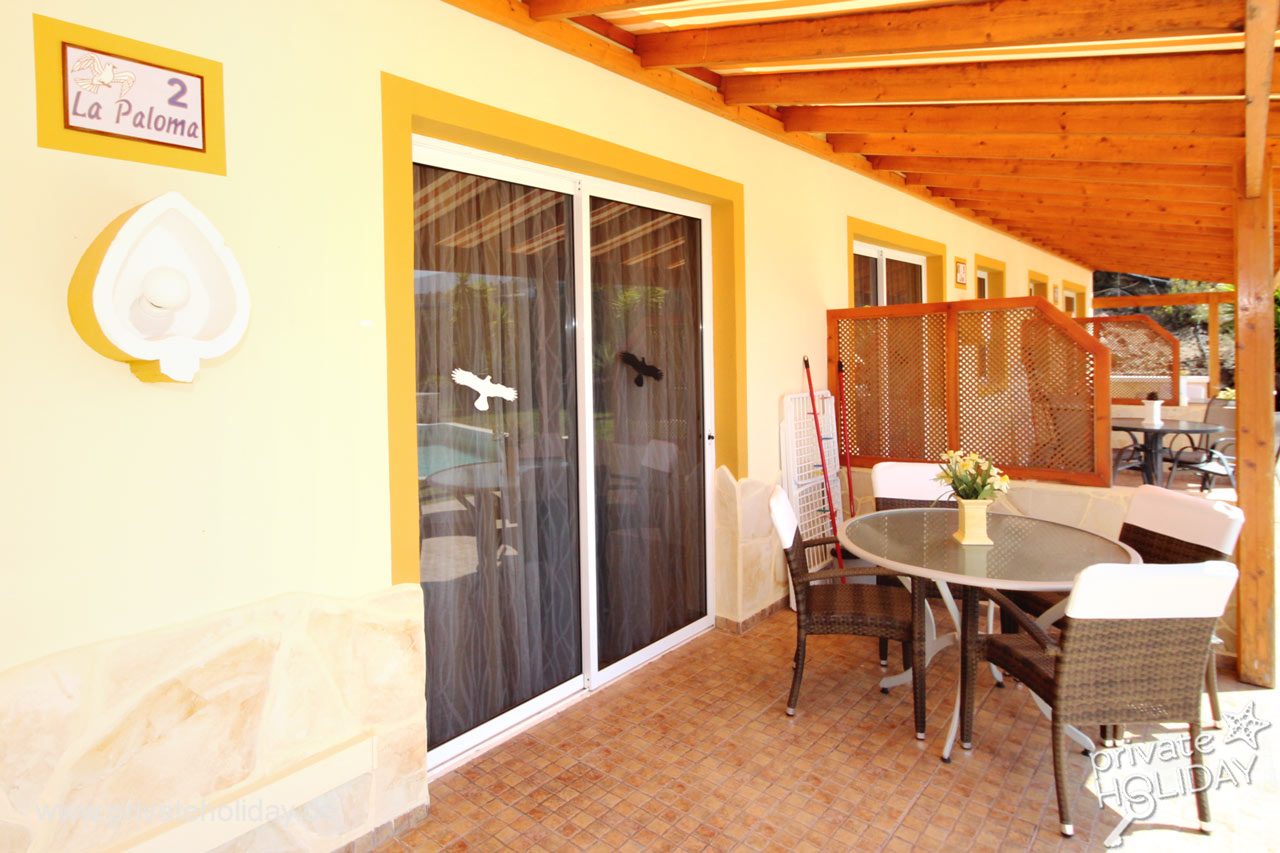 Terrazza coperta con tavolo da pranzo e porta scorrevole – Chio, Tenerife