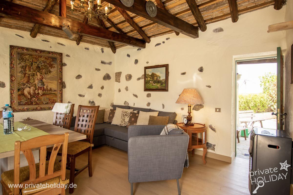 Living room with sofa and open terrace access – Guía de Isora, Tenerife