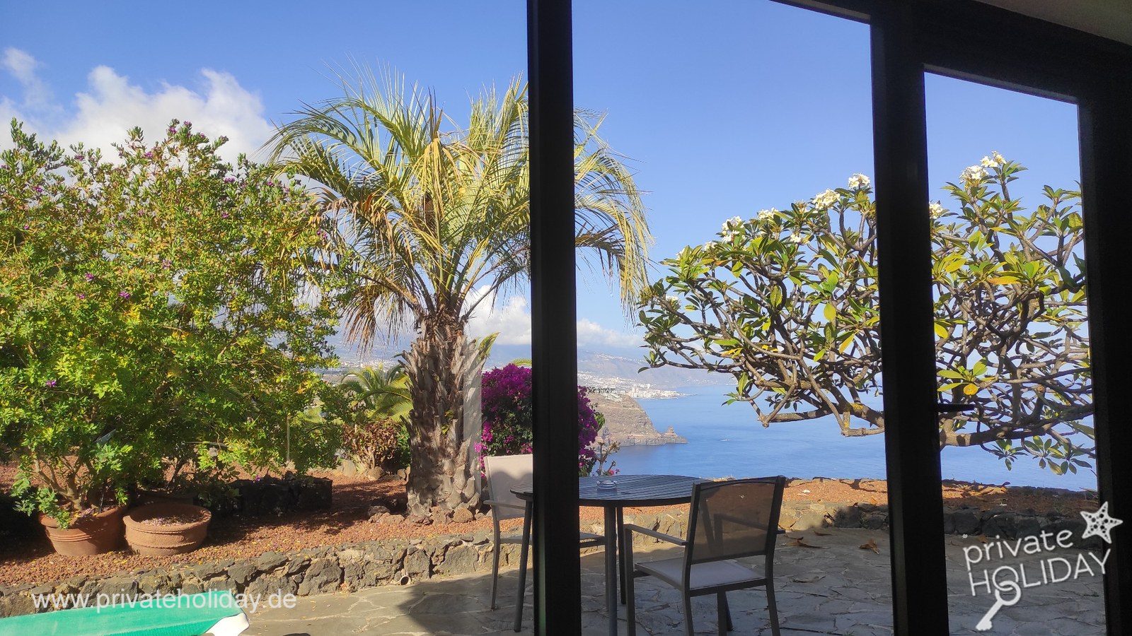 Terrasse couverte avec porte vitrée et vue sur le jardin – La Matanza, Ténérife