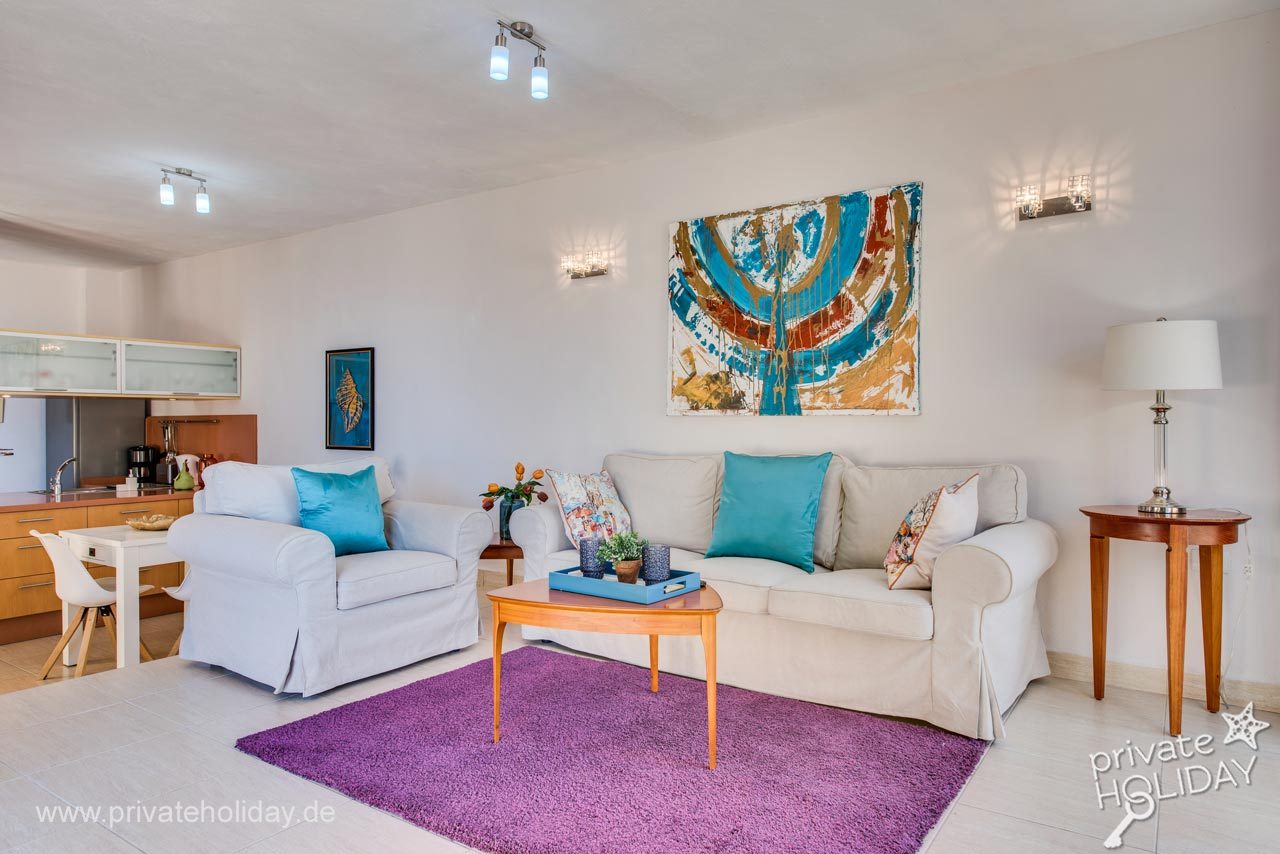 Bright living area with sofa and kitchenette – Guía de Isora, Tenerife