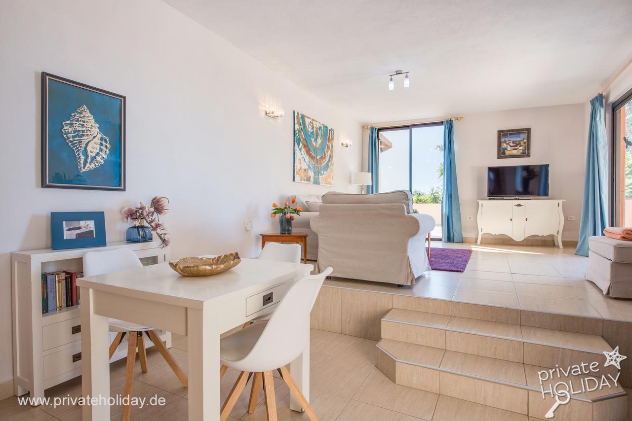 Dining area with table and steps to living room – Guía de Isora, Tenerife