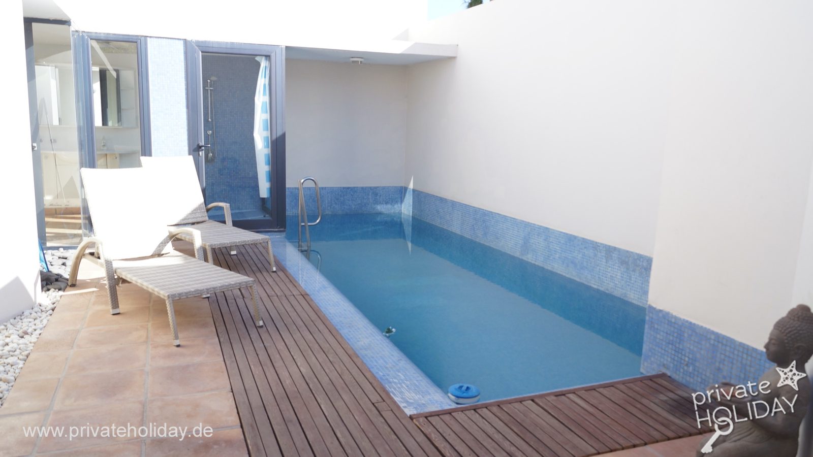 Narrow pool with wooden deck and lounger – Costa Calma, Fuerteventura