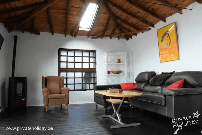 Living room with armchair, sofa and wooden table – Icod de los Vinos, Tenerife